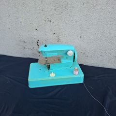 Kid vintage toy sewing machine