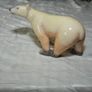 Stone sculpture of a white polar bear Image 2