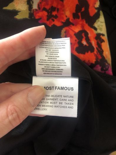 Black dress with flower design from Almost Famous