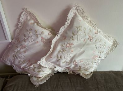 vintage-style cream cushion covers