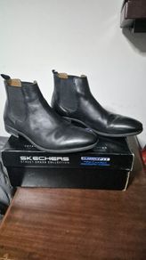 black leather sketcher boots