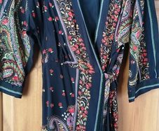 Dress  wrap style but full dress under bottom half  zara size L will suit 12/14 elasticated waist at back