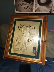 Cowan whisky mirror