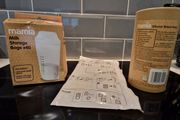 Breast pump and milk storage bags unopened and unused