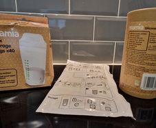 Breast pump and milk storage bags unopened and unused