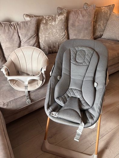 Mash high chair with changeable baby seat.