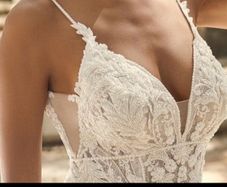 maggie sottero wedding dress and cathedral length veil