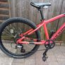 Rockrider ST 900. 24in wheels, mechanical disc brakes, front suspension forks, 8 gears. In good working order with the usual scrapes and scratches from kid use. Image 6
