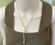 Silver tone pendant necklace