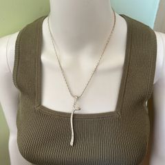 Silver tone pendant necklace