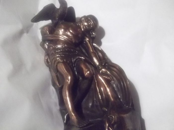 a bronze or metal the death of cuchulainn statue