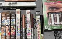 The balm tinted brow gel, clear brow gel, white, black eye pencils, liquid eyeliners