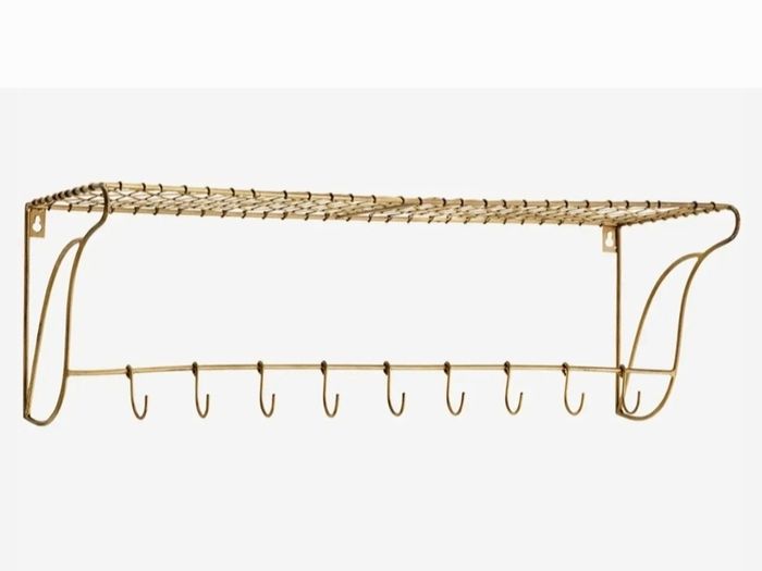 Danish interior design brass shelf with hooks