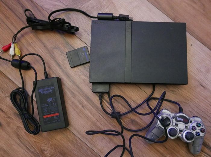 Playstation 2 slim - PS2 slim (works well)