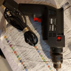 Argos 500W Hammer Drill, Model PDI13YE3. in excellent condition and works great