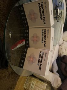 Heated foot massagers