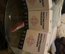 Heated foot massagers