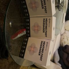 Heated foot massagers
