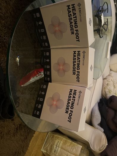 Heated foot massagers