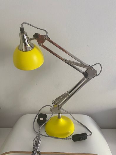 Yellow adjustable desk lamp with Chrome Articulated Arm