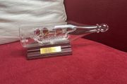 Glass ship in a bottle