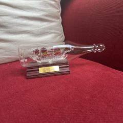 Glass ship in a bottle