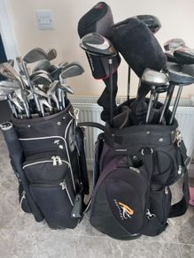 A selection of golf clubs and bags.