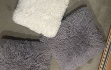 3 fluffy cushions