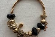 Gold &amp; Black Religious Cross Dangle Charm Beaded Bracelet  Description