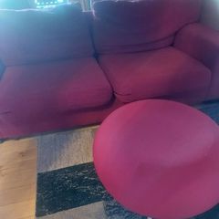 Red sofa and footstool