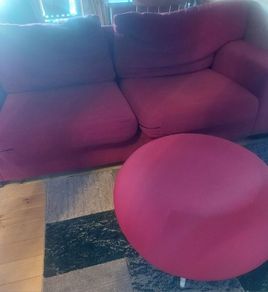 Red sofa and footstool