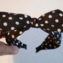 Black & White Head Band With Bow On Top. Image 3