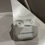 AirPods Pro 2 left earbud and case Image 2