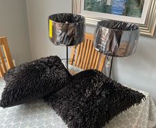 Two Black shaggy chenille cushions