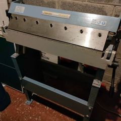 Sheet metal folding machine