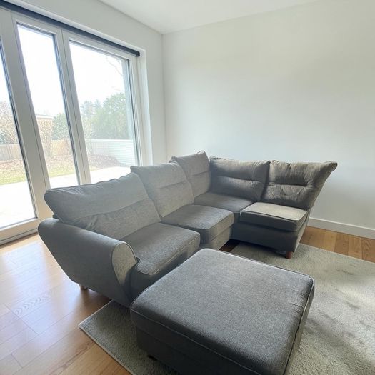 grey corner sofa with matching footstool