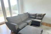 grey corner sofa with matching footstool