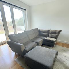 grey corner sofa with matching footstool