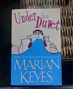 Under the Duvet.  Marian Keyes. Four books 10 euro