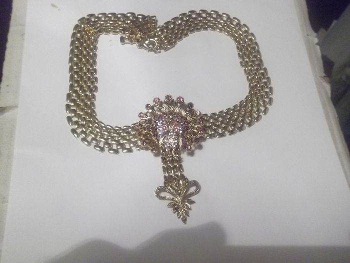 a vintage gold colour penden