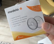 pregnancy ball, pillow, vitamins and nipple formers