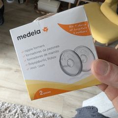pregnancy ball, pillow, vitamins and nipple formers