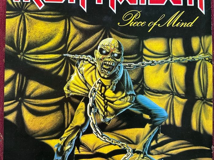 Iron Maiden Original 1984 release piece of mind. Sleeve in vg+ condition. Vinyl is vg with scuff marks that doesn't affect sound quality