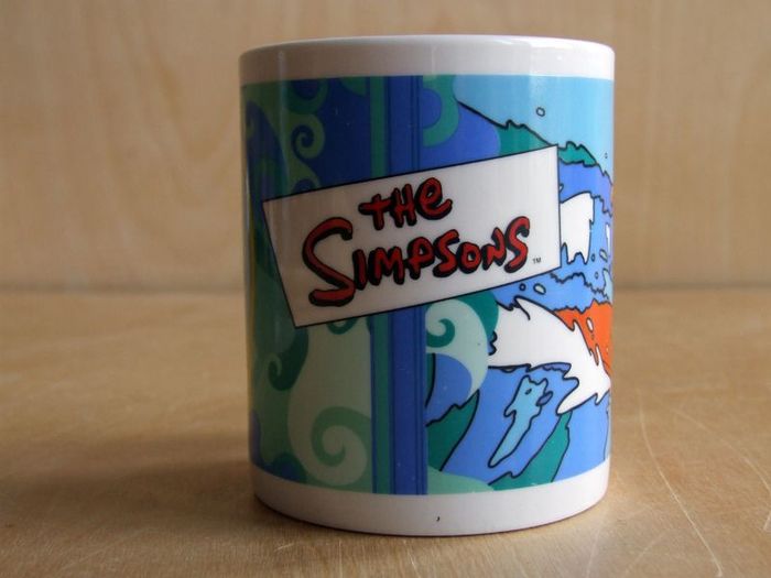 The Simpsons Bart and Maggie surfing mug