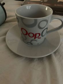 6 coffee mugs and saucers