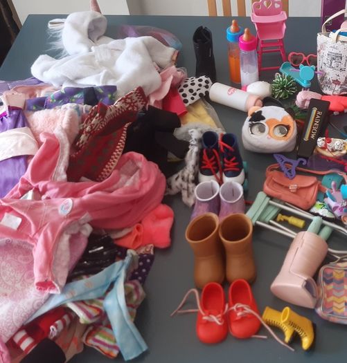 Collection of dolls,clothes and accessories