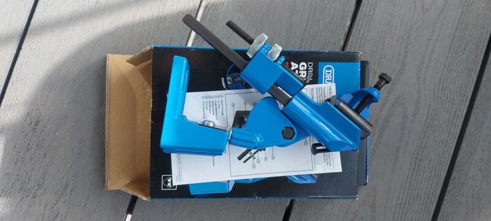 Drill bits grinding attachment