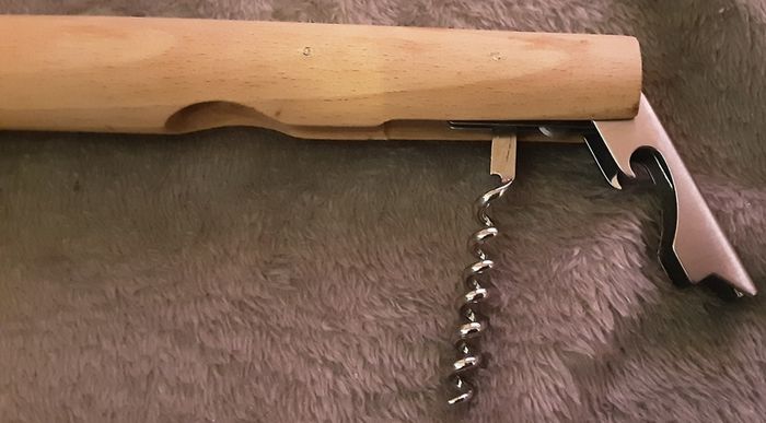 unusual bottle opener, approx a foot long