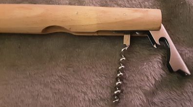 unusual bottle opener, approx a foot long