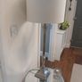 silver table lamp and table Image 3